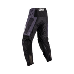 Black motocross pants with gray accents on a white background