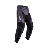 Gray and black pants with Leatt branding on a white background